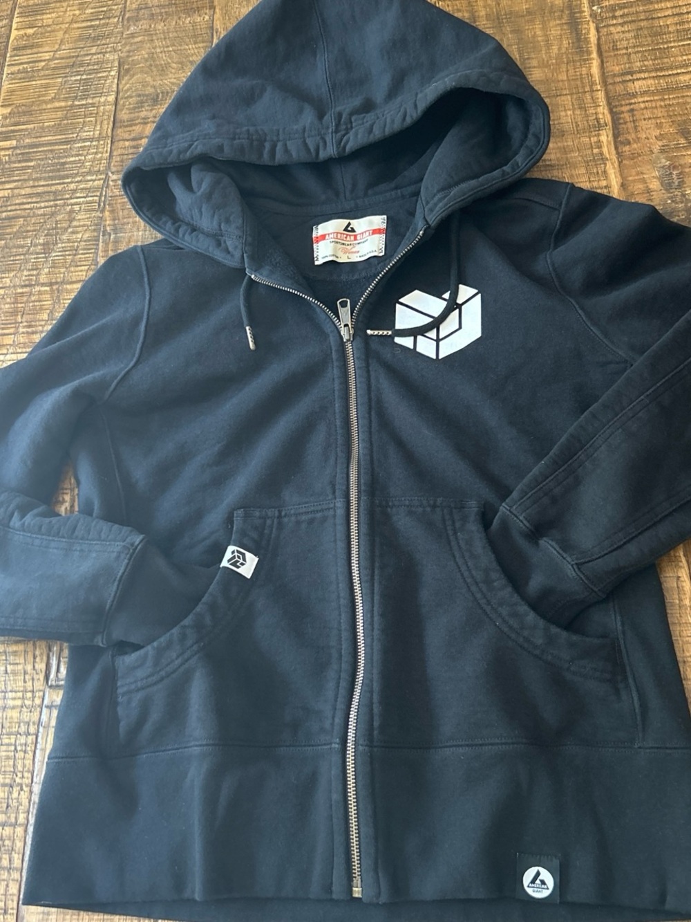 American Giant Black Zip Hoodie with White Geometric Logo